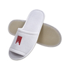 OEM Custom Logo Wholesale Cheap Disposable White Guest Bedroom Slippers for Spa Cotton Terry Velour EVA Sole Hotel Slippers