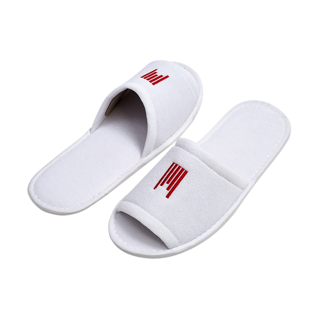 OEM Custom Logo Wholesale Cheap Disposable White Guest Bedroom Slippers for Spa Cotton Terry Velour EVA Sole Hotel Slippers